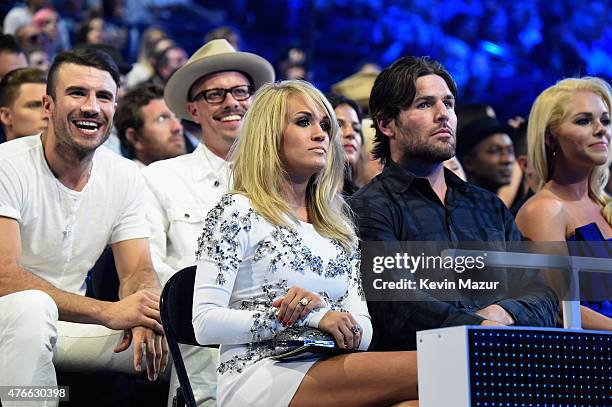 Sam Hunt, Singer Carrie Underwood and her husband Mike Fisher attend the 2015 CMT Music awards at the Bridgestone Arena on June 10, 2015 in...