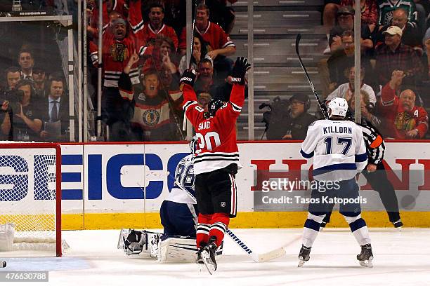 Brandon Saad of the Chicago Blackhawks celebrates after scoring a goal in the third period against Andrei Vasilevskiy of the Tampa Bay Lightning...