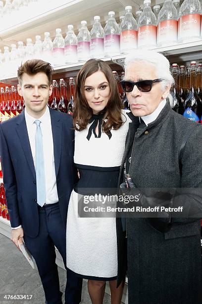 Actress Keira Knightley pose between her husband James Righton and Fashion designer Karl Lagerfeld after the Chanel show as part of the Paris Fashion...