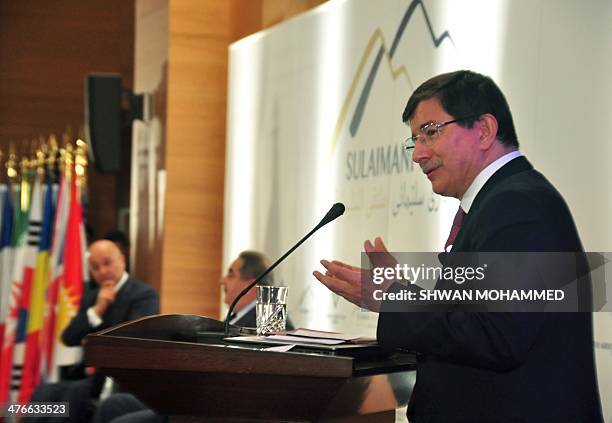 Turkey's foreign minister Ahmet Davutoglu delivers a speech on March 4, 2014 during the Sulaimaniyah Forum, a gathering of academics and politicians,...