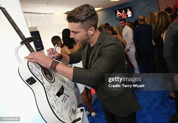 Singer Nick Fradiani attends the American Airlines Suite during 2015 CMT Music Awards at Bridgestone Arena on June 10, 2015 in Nashville, Tennessee.