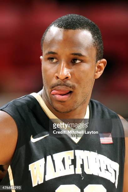 Travis McKie of the Wake Forest Demon Deacons looks on during a college basketball game against the Maryland Terrapins on February 18, 2014 at the...