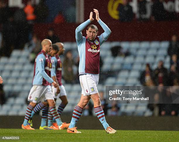 Grant Holt of Aston Villa applauds the Norwich City fans at the end of Barclays Premier League match between Aston Villa and Norwich City at Villa...