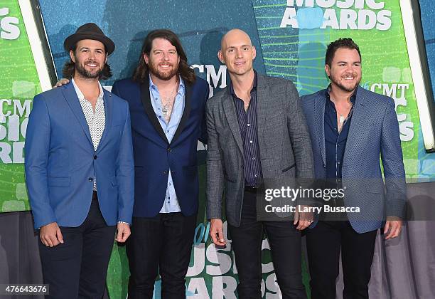 Chris Thompson; James Young; Jon Jones; Mike Eli of Eli Young Band attend the 2015 CMT Music awards at the Bridgestone Arena on June 10, 2015 in...