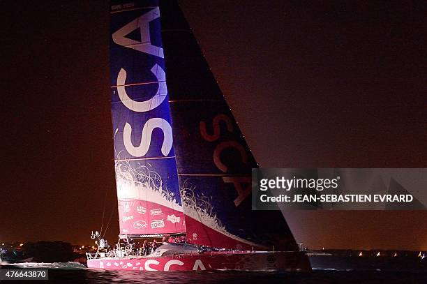 Team SCA skippered by English Sam Davies arrives to Lorient in first position during the finish of Leg 8 of the Volvo Ocean Race from Lisbon to...