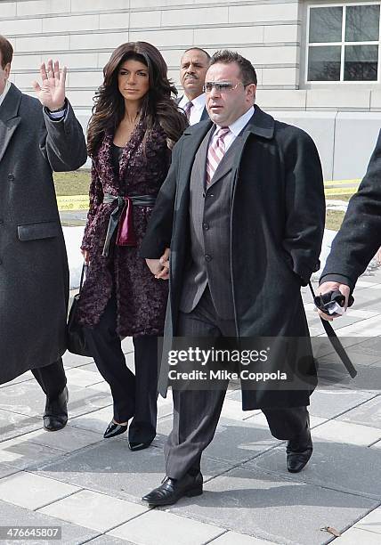 Teresa Giudice and Joe Giudice leave court after facing charges of defrauding lenders, illegally obtaining mortgages and other loans as well as...