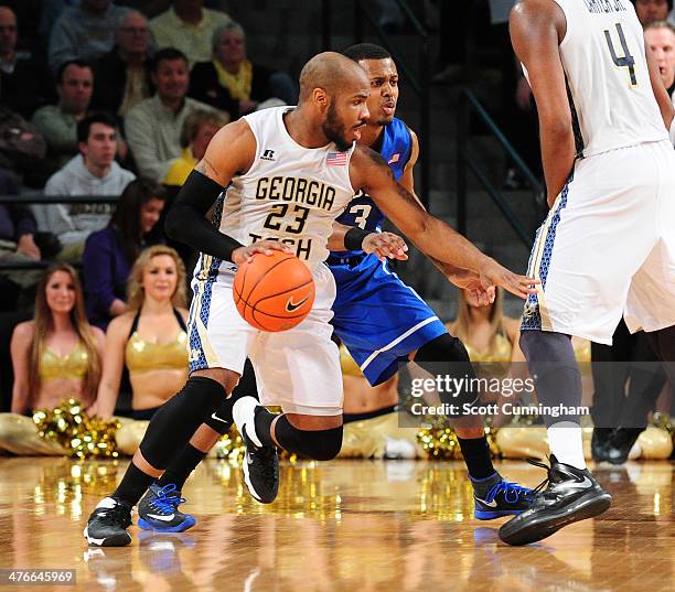 Trae Golden of the Georgia Tech Yellow Jackets drives against the Duke Blue Devils at McCamish Pavilion on February 18, 2014 in Atlanta, Georgia....