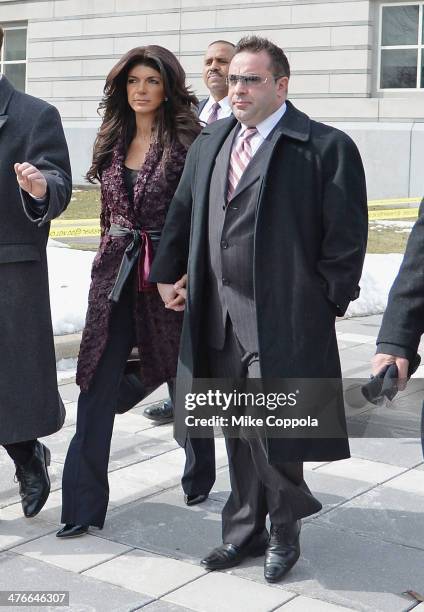 Teresa Giudice and Joe Giudice leave court after facing charges of defrauding lenders, illegally obtaining mortgages and other loans as well as...