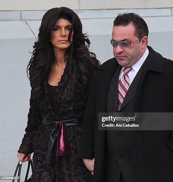 Teresa Giudice and Joe Giudice are seen outside a federal criminal court, where they face mortgage and bankruptcy fraud charges on March 4, 2014 in...