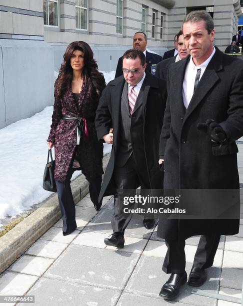 Teresa Giudice and Joe Giudice are seen outside a federal criminal court, where they face mortgage and bankruptcy fraud charges on March 4, 2014 in...