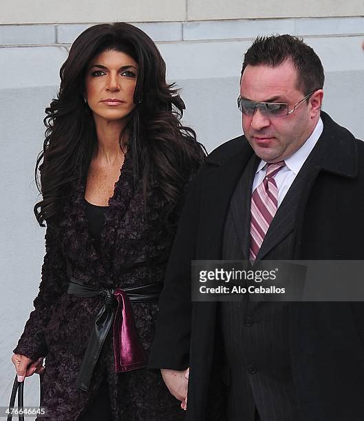 Teresa Giudice and Joe Giudice are seen outside a federal criminal court, where they face mortgage and bankruptcy fraud charges on March 4, 2014 in...