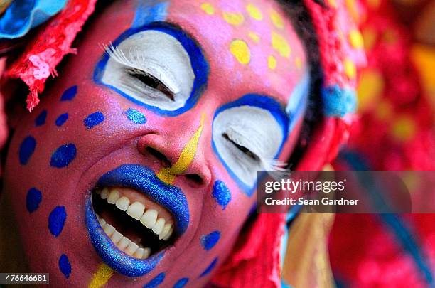 Members of the Krew of Mondo Kayo Social Marching Club parde Mardi Gras day in the rain on March 4, 2014 in New Orleans, Louisiana. Fat Tuesday, the...