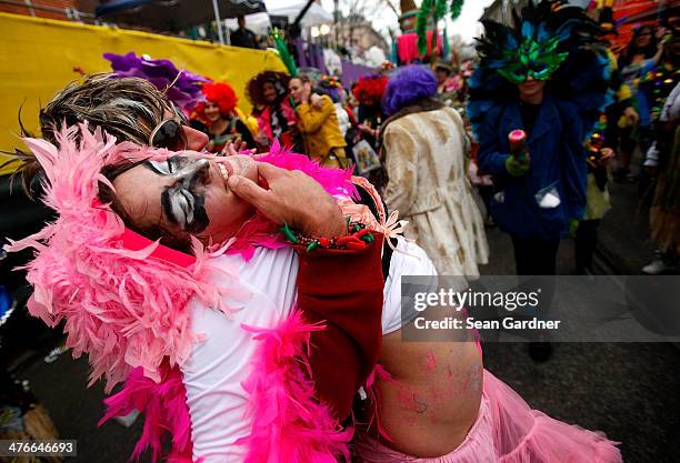 Members of the Krew of Mondo Kayo Social Marching Club parde Mardi Gras day in the rain on March 4, 2014 in New Orleans, Louisiana. Fat Tuesday, the...