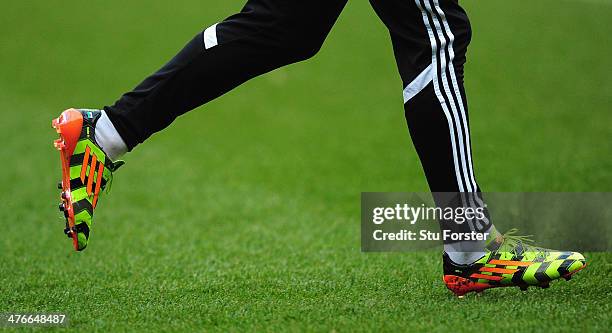 Close up of Wales player Gareth Bale's colourfull boots during Wales training ahead of their match against Iceland at Cardiff City Stadium on March...