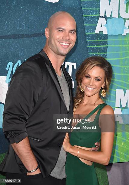 Mike Caussin and Jana Kramer attend the 2015 CMT Music awards at the Bridgestone Arena on June 10, 2015 in Nashville, Tennessee.