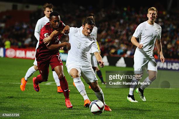 Gelson Martins of Portugal contests with Deklan Wynne of New Zealand during the FIFA U-20 World Cup New Zealand 2015 Round of 16 match between...