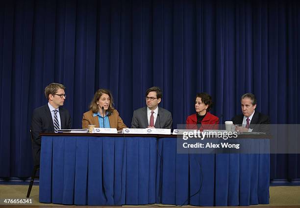 Office of Management and Budget Director Sylvia Burwell speaks as White House Press Secretary Jay Carney , Chairman of Council of Economic Advisers...