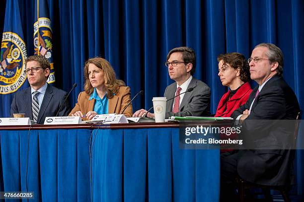 Jay Carney, White House press secretary, from left, moderates a news conference with Sylvia Mathews Burwell, director of the Office of Management and...