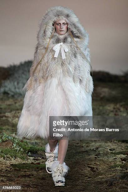 Model walks the runway during the Alexander McQueen show as part of the Paris Fashion Week Womenswear Fall/Winter 2014-2015 on March 4, 2014 in...