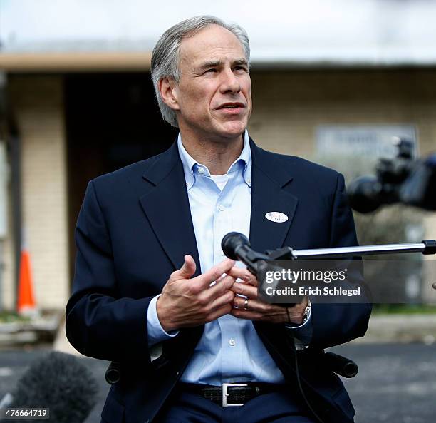Republican candidate for governor, Texas Attorney General Greg Abbott speaks to the press after voting in the Texas primary at Western Hills Church...