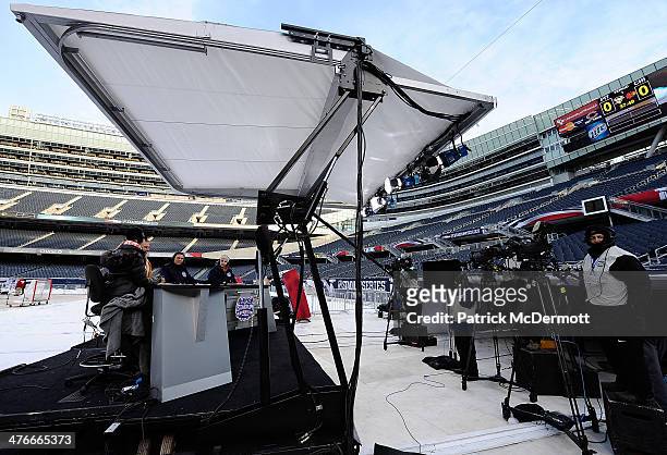 Network host Kathryn Tappen, Barry Melrose, Jamie McLennan, and Jamal Mayers on set during the 2014 NHL Stadium Series practice day on February 28,...