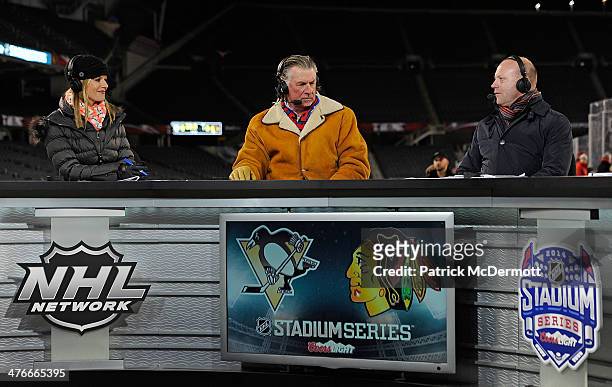 Vice President of Hockey Operations Al MacIsaac of the Chicago Blackhawks talks with Kathryn Tappen and Barry Melrose of the NHL Network during the...