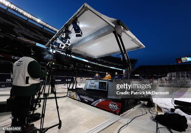 Network host Kathryn Tappen, Barry Melrose, Jamie McLennan, and Jamal Mayers on set during the 2014 NHL Stadium Series practice day on February 28,...