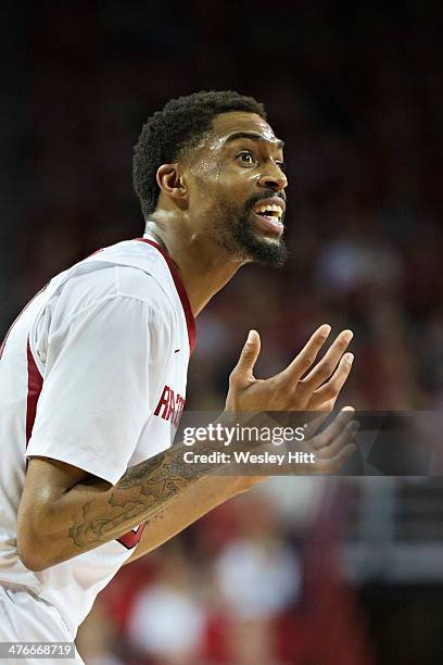 Rashad Madden of the Arkansas Razorbacks reacts after being called for a foul during a game against the Georgia Bulldogs at Bud Walton Arena on March...