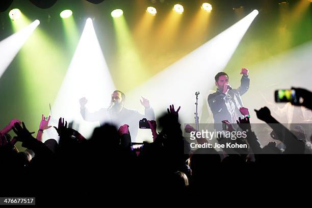 Musicians Sebu Simonian and Ryan Merchant of Capital Cities performs live at the Roxy on February 28, 2014 in Los Angeles, California.