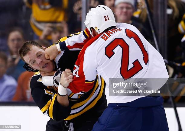 Krys Barch of the Florida Panthers fights Shawn Thornton of the Boston Bruins in the second period during the game at TD Garden on March 4, 2014 in...