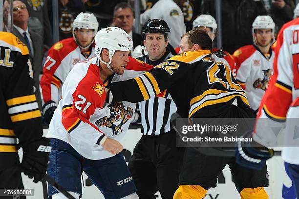 Krys Barch of the Florida Panthers fights against Shawn Thornton of the Boston Bruins at the TD Garden on March 4, 2014 in Boston, Massachusetts.