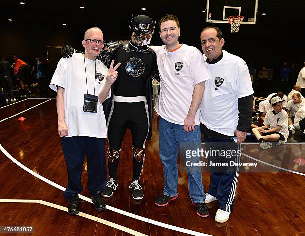 BrooklyKnight poses with Special Olympics New York athletes attending a basketball clinic at Barclays practice court at Barclays Center on March 4,...