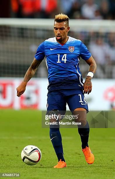 Danny Williams of USA runs with the ball during the International Friendly match between Germany and USA at RheinEnergieStadion on June 10, 2015 in...