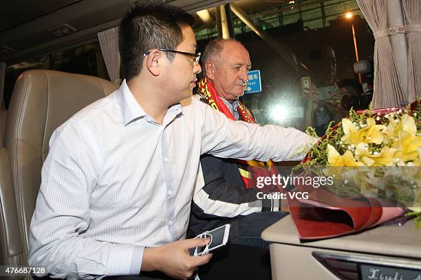 Football fans welcome Luiz Felipe Scolari, new coach of Guangzhou Evergrande, on his arrival at Baiyun International Airport on June 11, 2015 in...