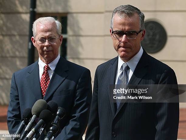 Andrew G. McCabe , Assistant Director of the FBI's Washington Field Office speaks while flanked by Dana J. Boente ,U.S. Attorney for the Eastern...