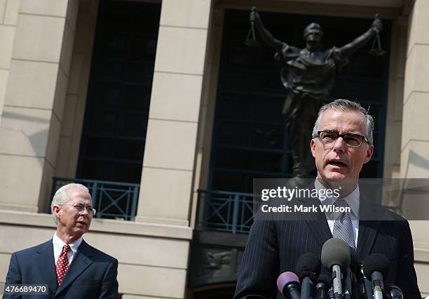 Andrew G. McCabe , Assistant Director of the FBI's Washington Field Office speaks while flanked by Dana J. Boente , U.S. Attorney for the Eastern...