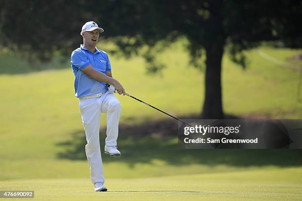 Ben Crane reacts to his second shot on the 16th hole during round one of the FedEx St. Jude Classic at TPC Southwind on June 11, 2015 in Memphis,...