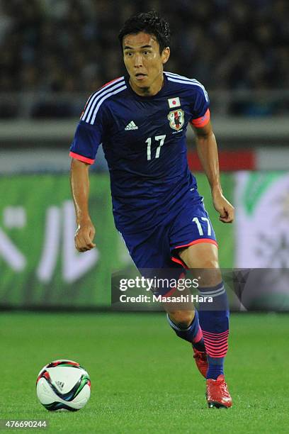 Makoto Hasebe of Japan in action during the international friendly match between Japan and Iraq at Nissan Stadium on June 11, 2015 in Yokohama, Japan.