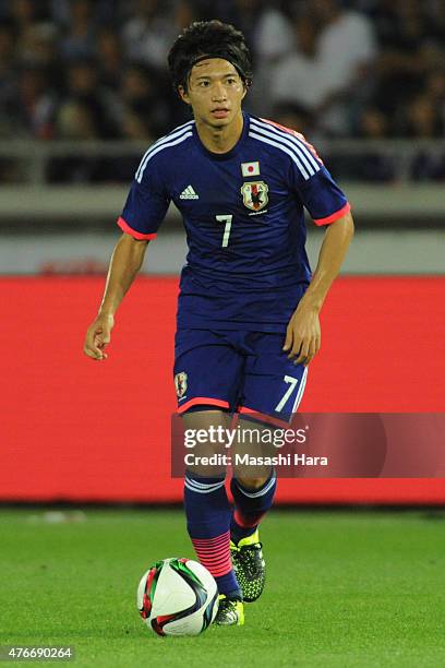 Gaku Shibasaki of Japan in action during the international friendly match between Japan and Iraq at Nissan Stadium on June 11, 2015 in Yokohama,...