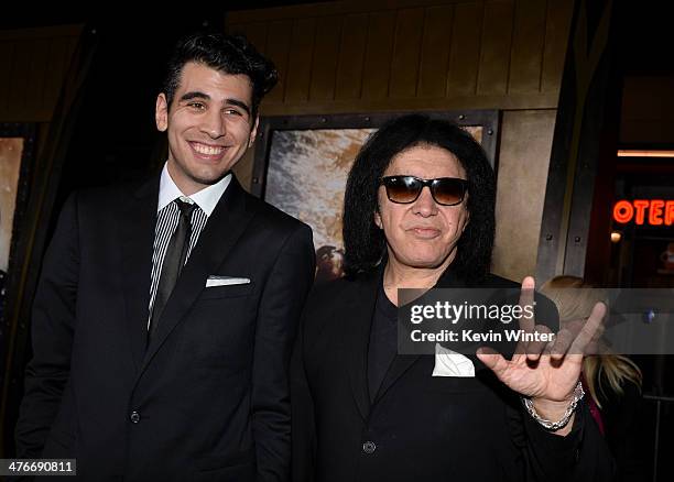 Musician Gene Simmons and Nick Simmons attend the premiere of Warner Bros. Pictures and Legendary Pictures' "300: Rise Of An Empire" at TCL Chinese...