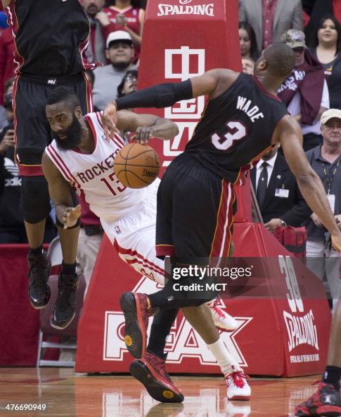 Axs Houston Rockets James Harden of the Houston Rockets is fouled by Dwyane Wade of the ...