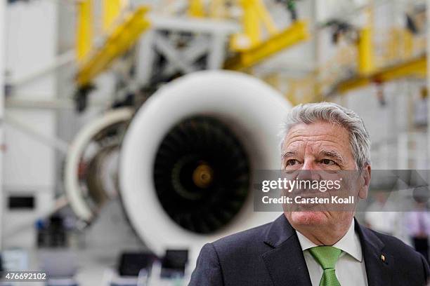 German President Joachim Gauck speaks to the media while visiting the Rolls-Royce Mechanical Testing Operations Center on June 11, 2015 near Berlin,...