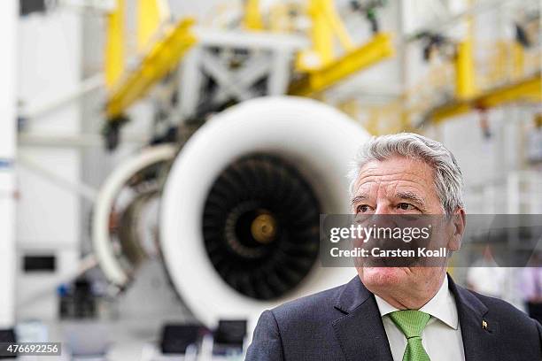 German President Joachim Gauck speaks to the media while visiting the Rolls-Royce Mechanical Testing Operations Center on June 11, 2015 near Berlin,...