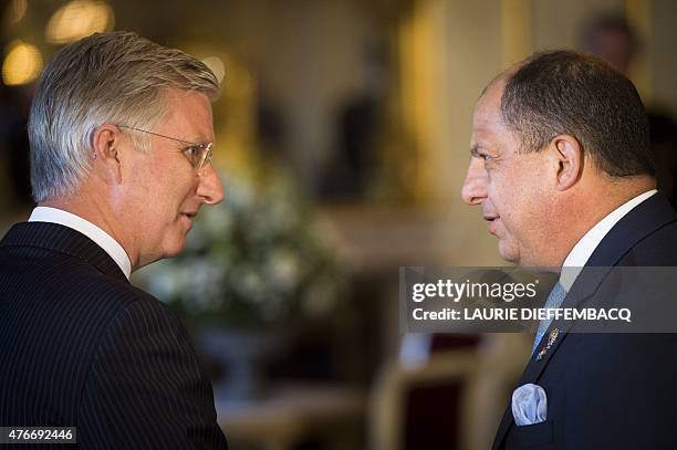 King Philippe of Belgium greets Costa Rica President Luis Guillermo Solis Rivera as the Royal couple receives the participants of the European Union...