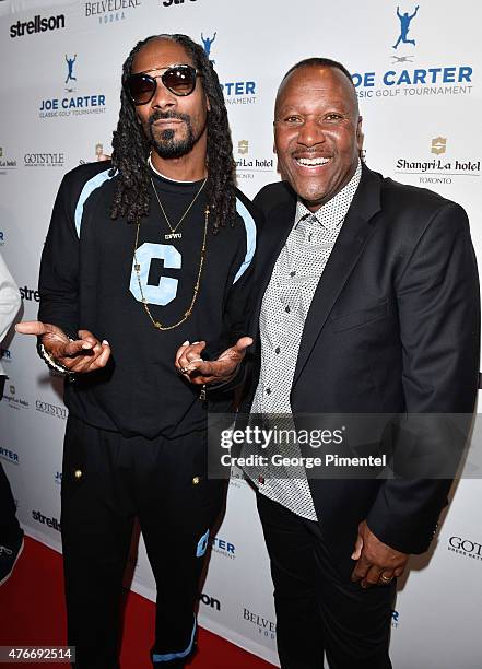 Snoop Dogg and Joe Carter attend Joe Carter Classic Celebrity Golf Tournament after party at Shangri-La Hotel on June 10, 2015 in Toronto, Canada.