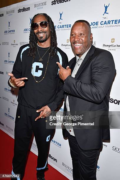 Snoop Dogg and Joe Carter attend Joe Carter Classic Celebrity Golf Tournament after party at Shangri-La Hotel on June 10, 2015 in Toronto, Canada.