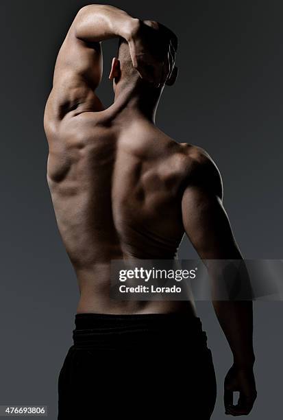 back view of a muscled black male - back body stock pictures, royalty-free photos & images