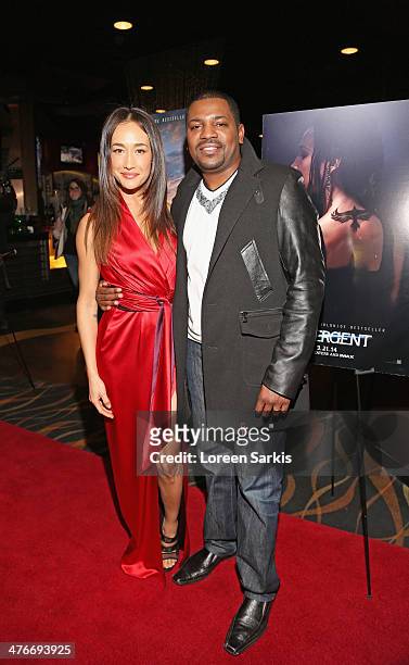Maggie Q and Mekhi Phifer attend the "Divergent" special screening at Emagine Royal Oak on March 4, 2014 in Royal Oak, Michigan.