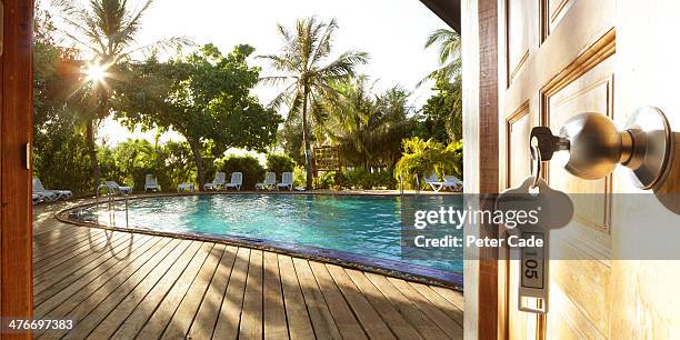 view of pool looking out from hotel room - sun deck stock pictures, royalty-free photos & images