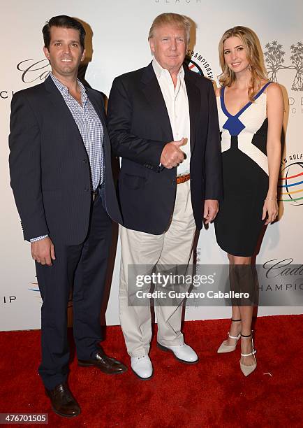 Donald Trump, Jr., Donald Trump, and Ivanka Trump attend The Opening Drive Party at Hyde Beach on March 4, 2014 in Miami, Florida.